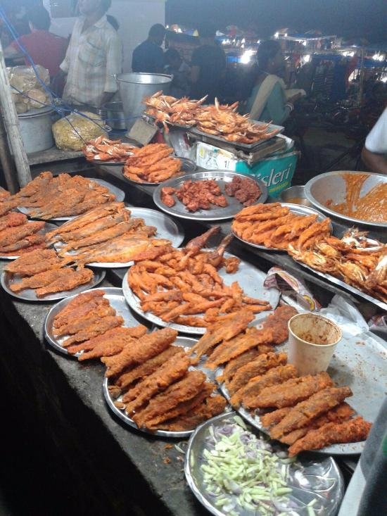 Savor fresh seafood at beachside shacks